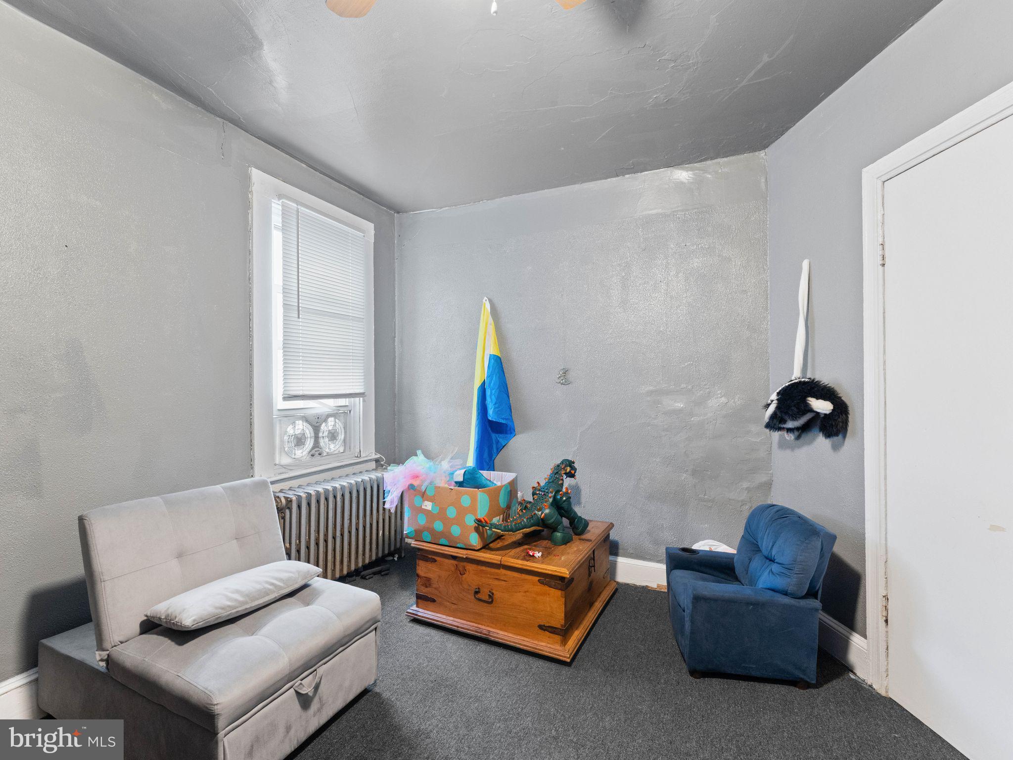 400 Market Street Marcus Hook, PA 19061 - Photo 19 of 25 a living room with furniture and a window