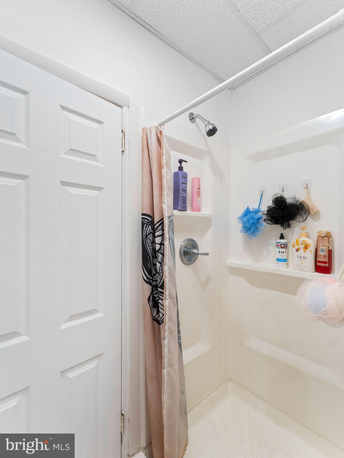 400 Market Street Marcus Hook, PA 19061 - Photo 21 of 25 a bathroom with a bathtub and shower