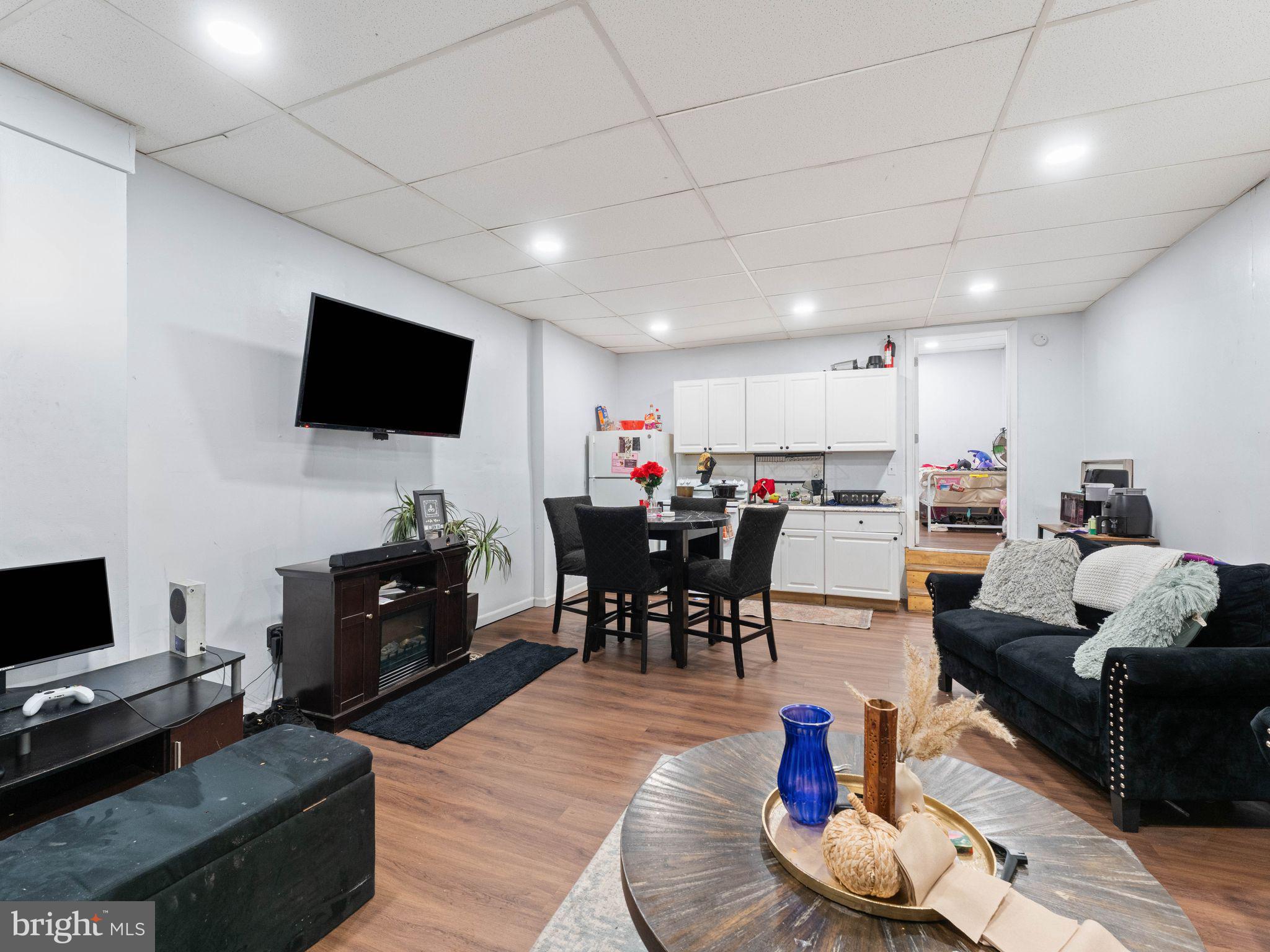400 Market Street Marcus Hook, PA 19061 - Photo 25 of 25 a living room with furniture and a flat screen tv