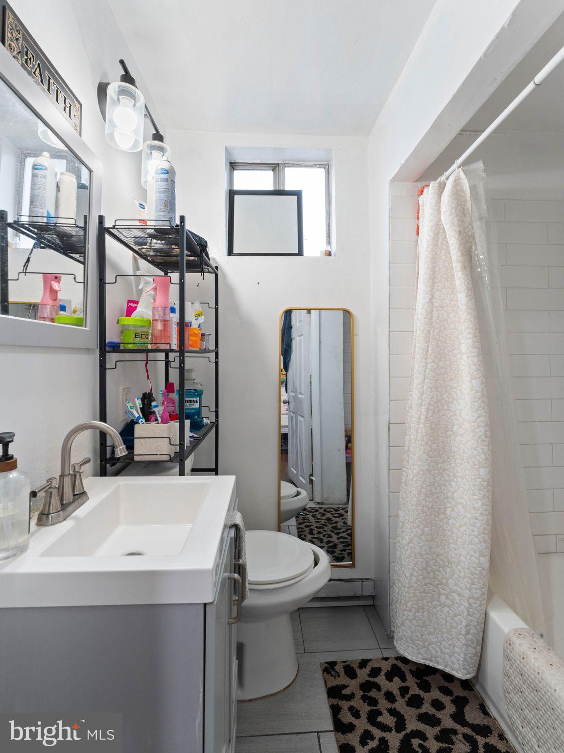 400 Market Street Marcus Hook, PA 19061 - Photo 7 of 25 a bathroom with a sink toilet and shower