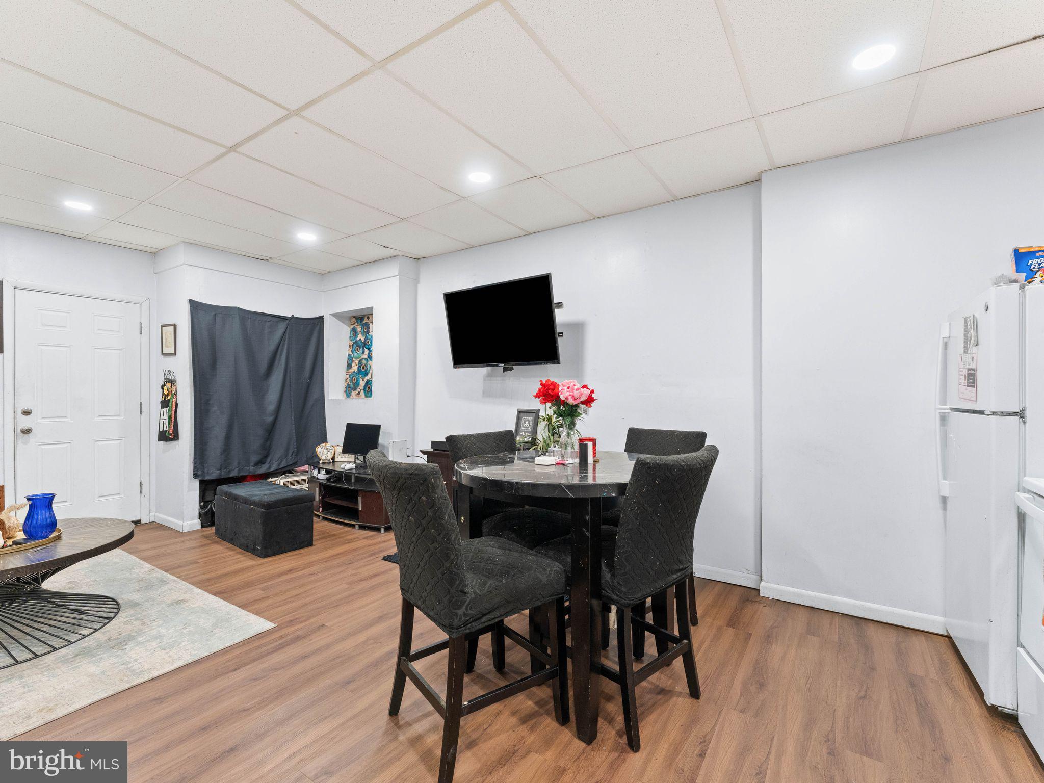 400 Market Street Marcus Hook, PA 19061 - Photo 9 of 25 a view of a dining room with furniture and wooden floor