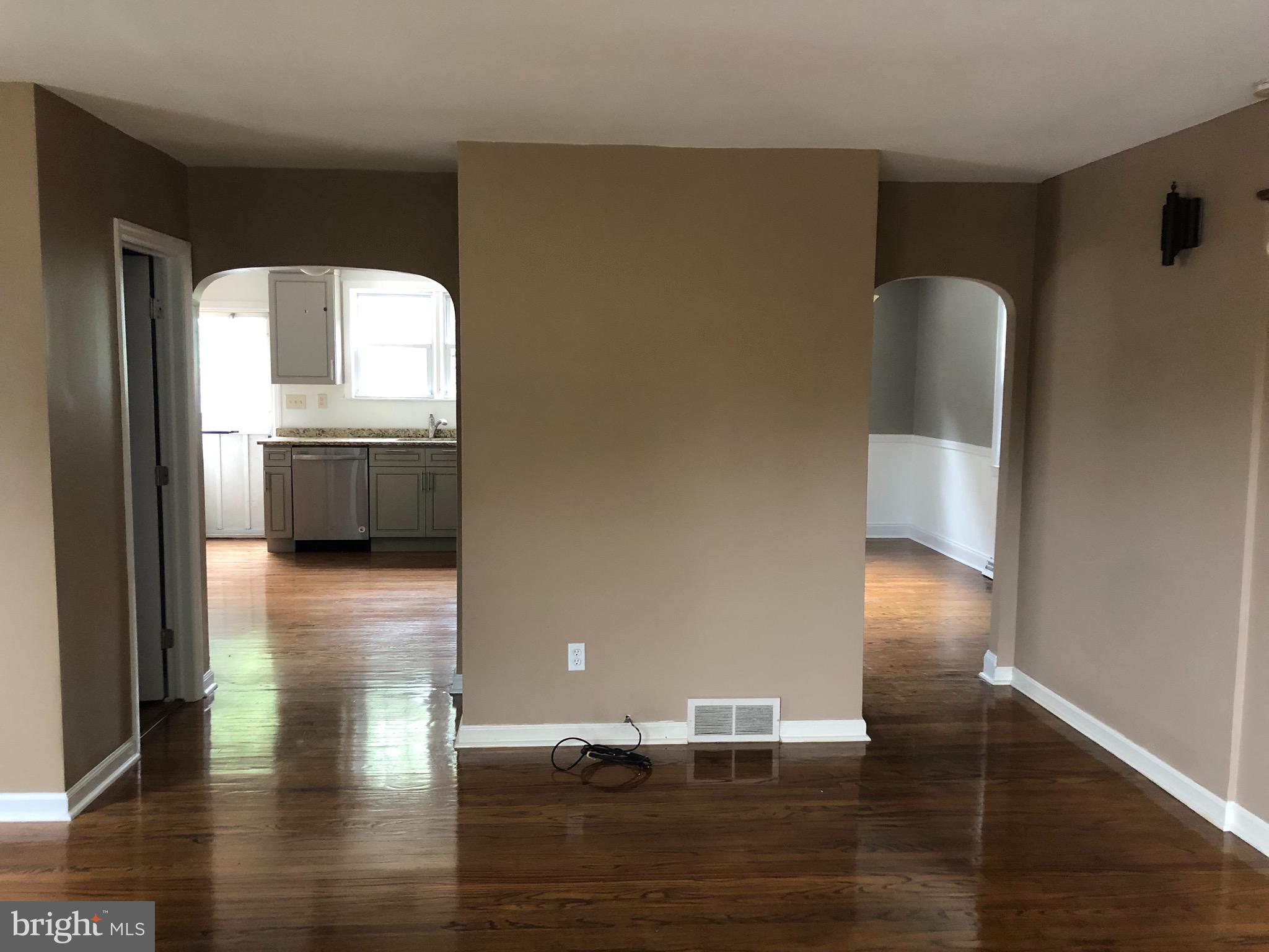 280 South Highland Road Springfield, PA 19064 - Photo 4 of 23 Living Room into kitchen & Dining Room