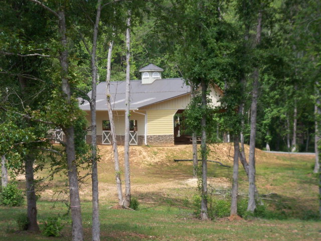 588 King Road Forsyth, GA 31029 - Photo 1 of 1 a front view of a house with a yard