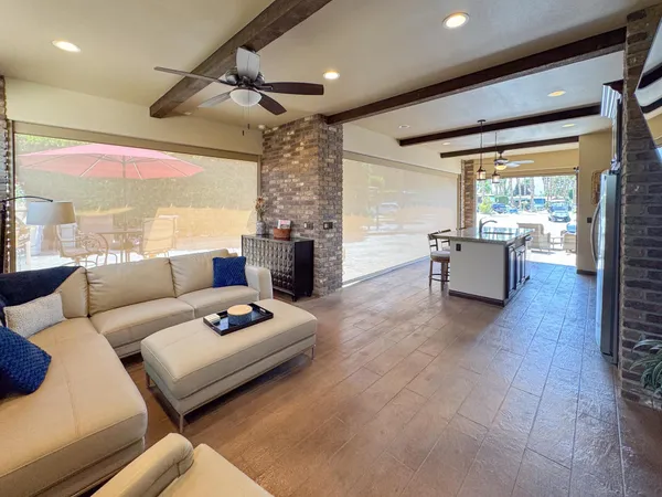 a living room with furniture and a table