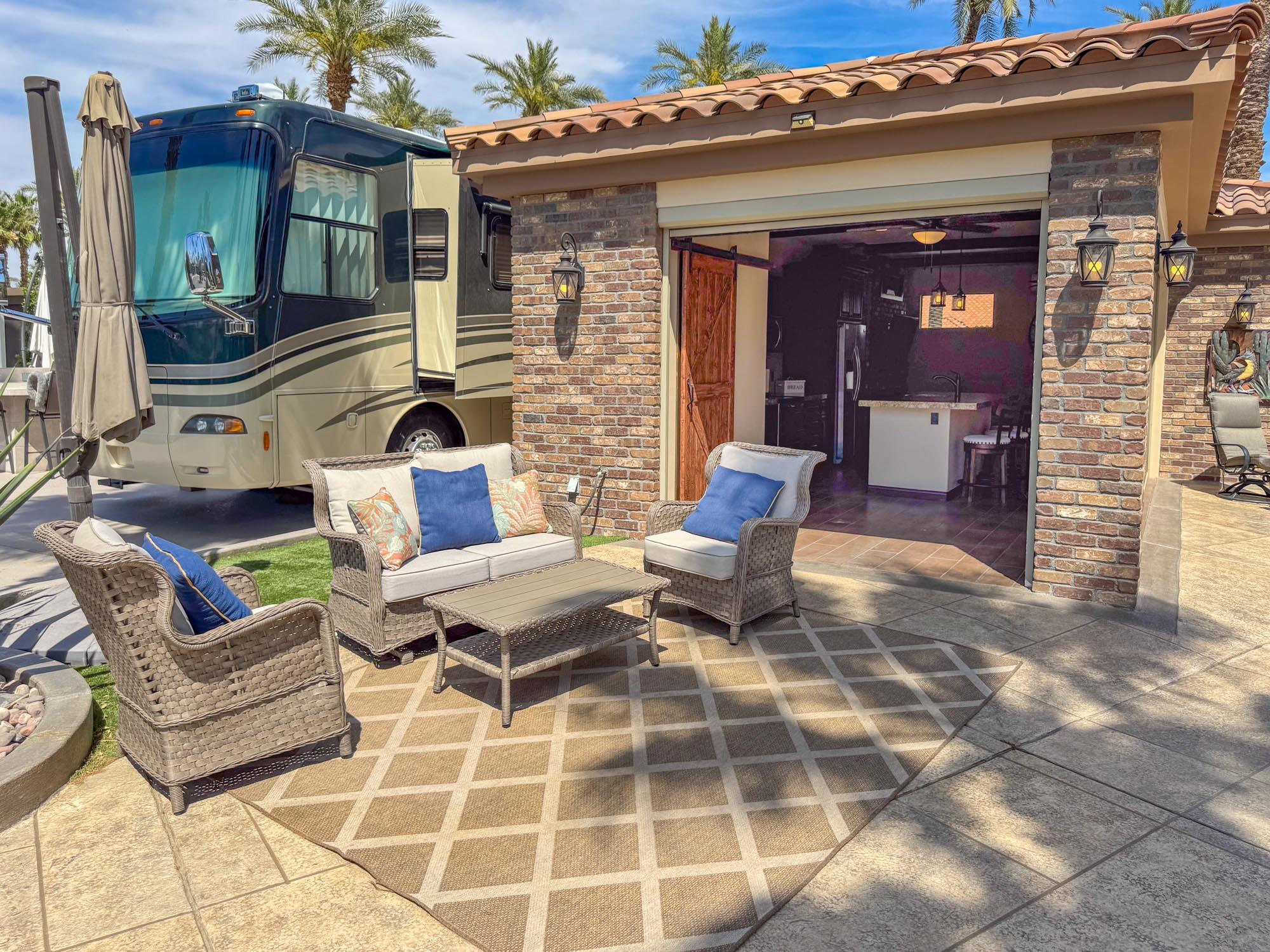 80394 Ave 48, Unit 116 Indio, CA 92201 - Photo 2 of 26 a building outdoor space with patio furniture