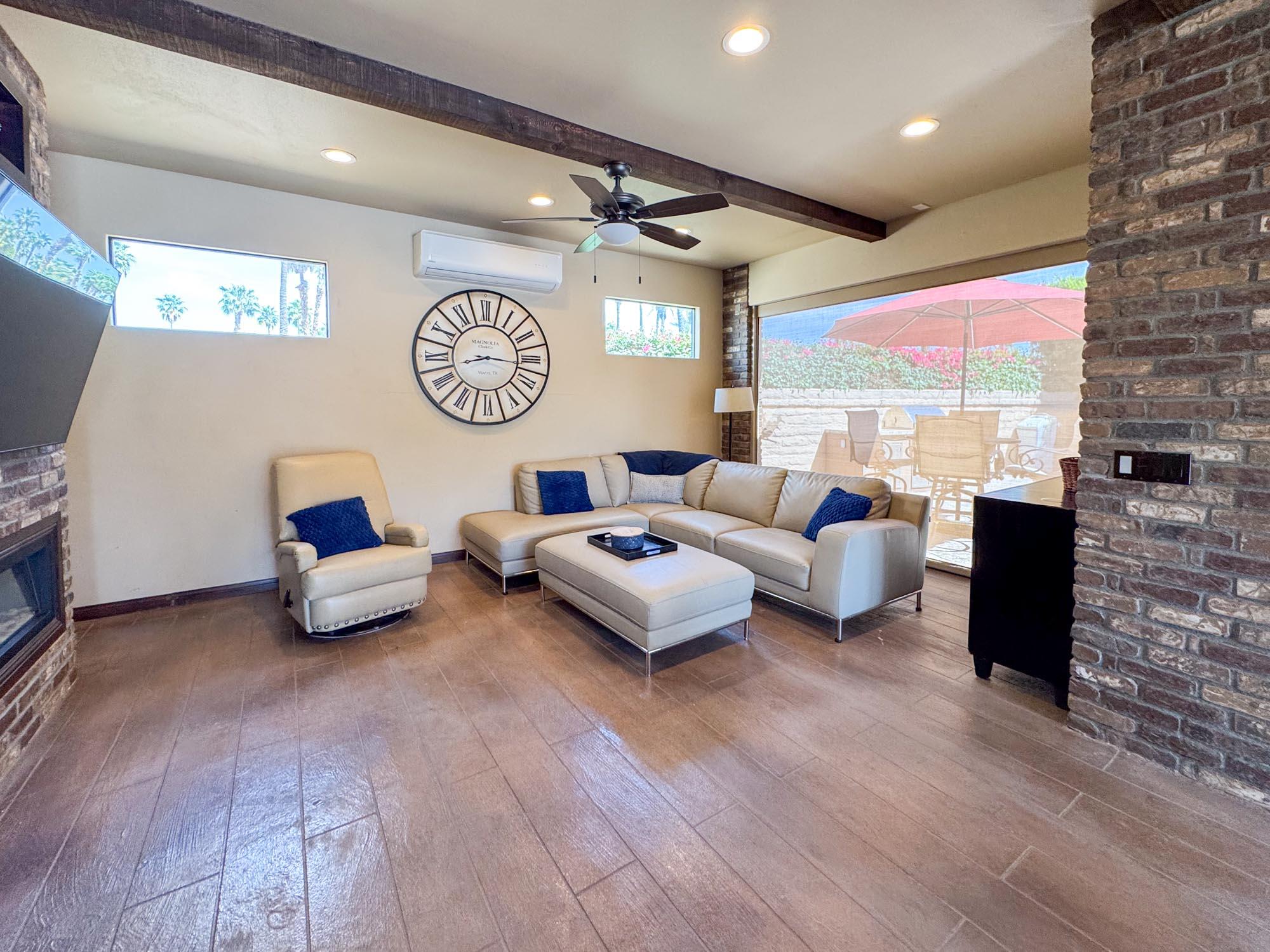 80394 Ave 48, Unit 116 Indio, CA 92201 - Photo 9 of 26 a living room with furniture and a flat screen tv