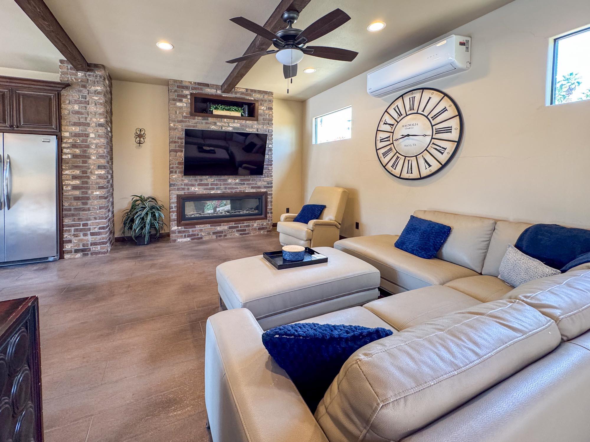 80394 Ave 48, Unit 116 Indio, CA 92201 - Photo 10 of 26 a living room with furniture and a flat screen tv