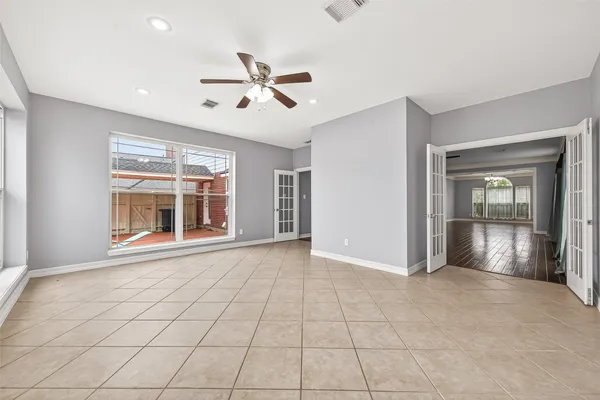 a view of an empty room with a window