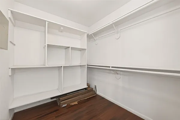 a view of an empty walk in closet