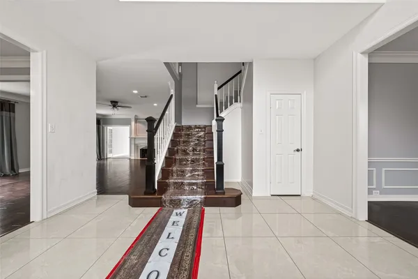 a view of an entryway with staircase