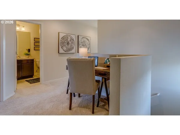 a black and white photo of a living room