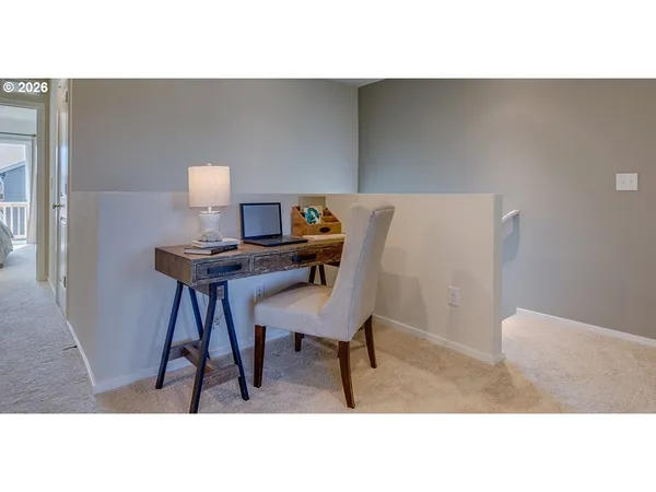 a living room with a couch and a table