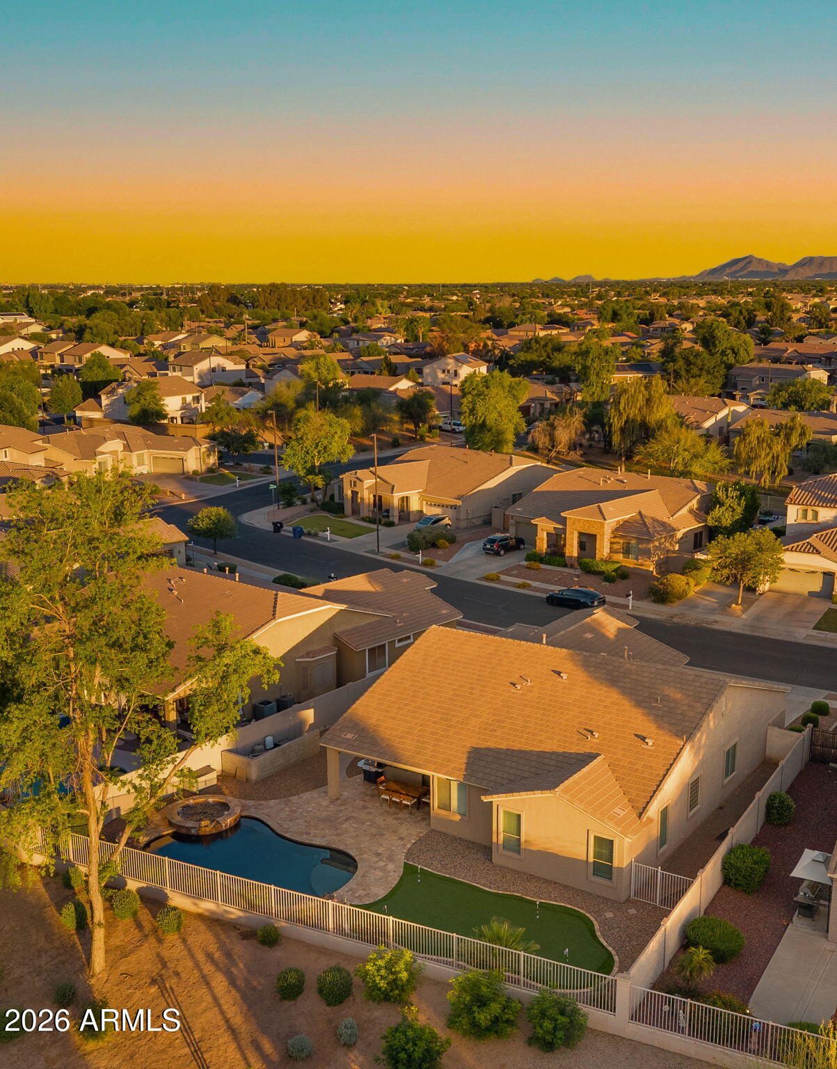 3344 East Hopkins Road Gilbert, AZ 85295 - Photo 27 of 32 an aerial view of residential houses with outdoor space
