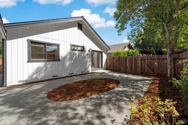 a backyard of a house with lots of green space
