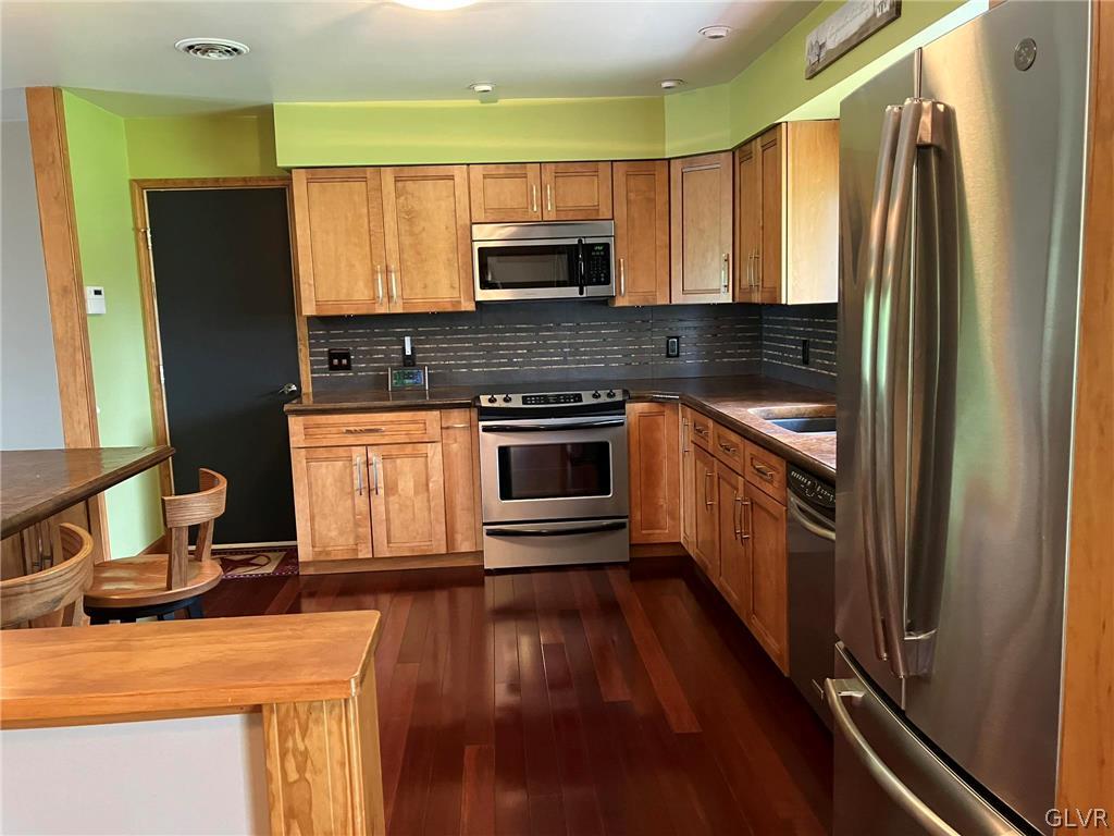 3934 Howertown Road Northampton, PA 18067 - Photo 9 of 50 Notice the Brazilian cherry like engineered hardwo