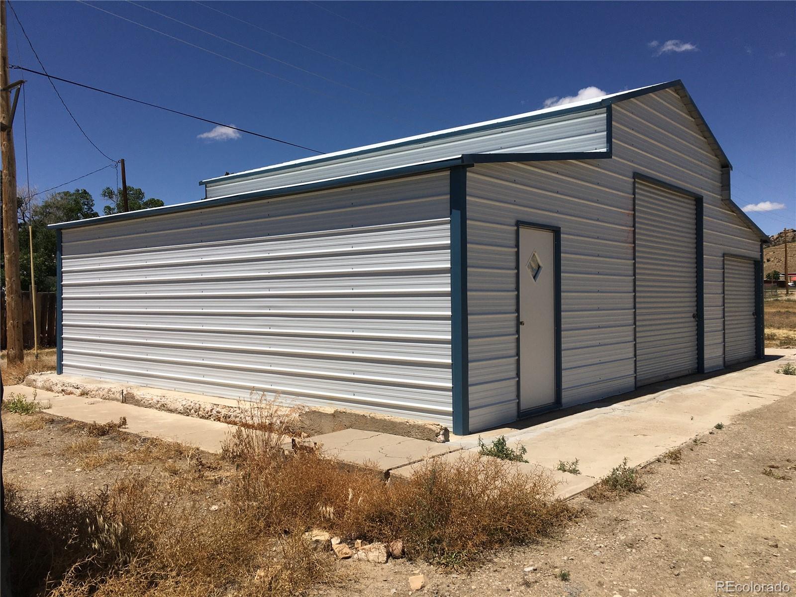 211 Stegosaurus Freeway Dinosaur, CO 81610 - Photo 3 of 12 a view of a backyard