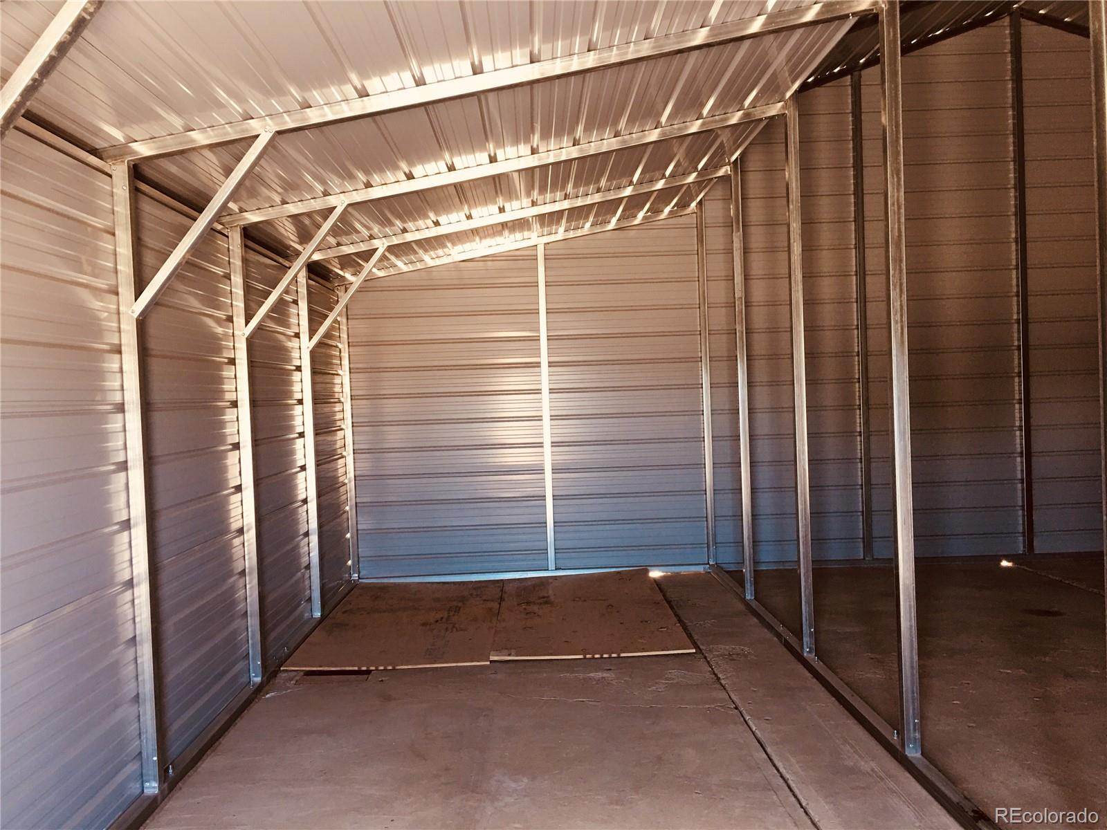 211 Stegosaurus Freeway Dinosaur, CO 81610 - Photo 4 of 12 a view of a wooden door