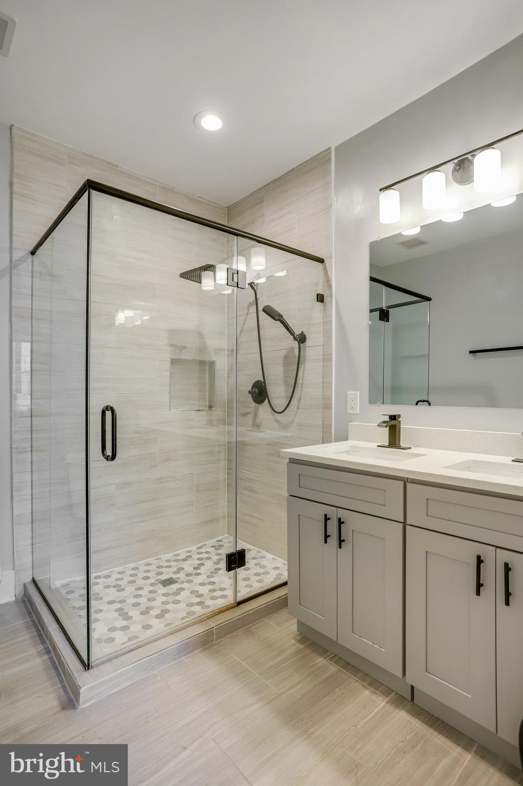 1225 Raum Street Northeast, Unit 1 Washington, DC 20002 - Photo 16 of 22 Large Walk-In Shower in Primary Bathroom