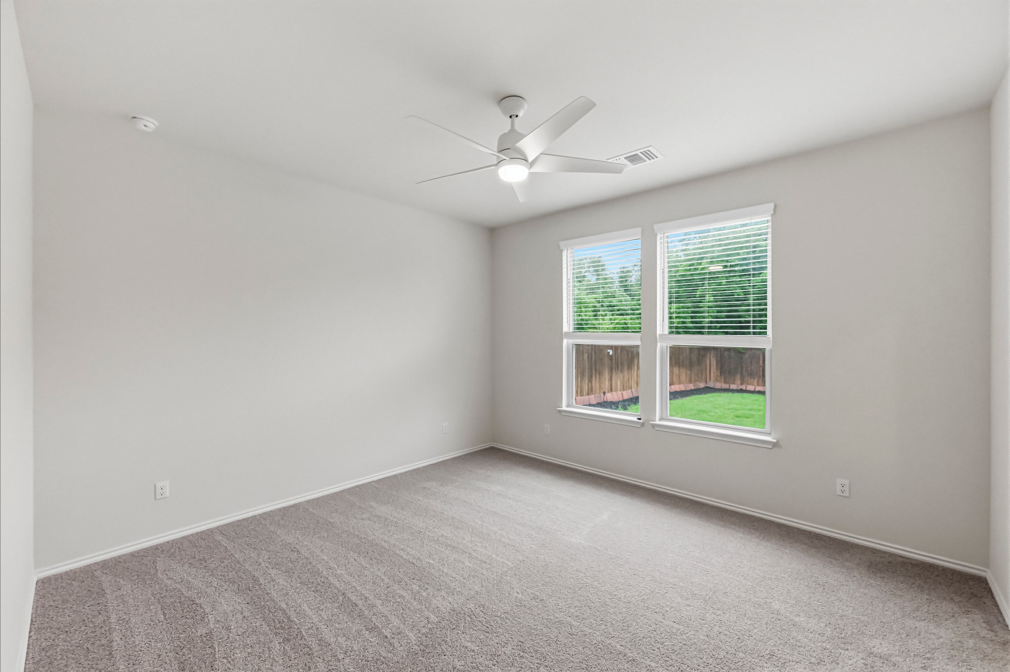 2124 Cliffbrake Way Georgetown, TX 78626 - Photo 11 of 31 The primary bedroom offers privacy & brand new carpet.