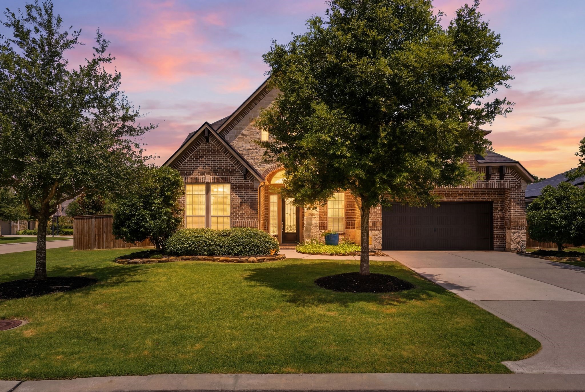 27705 South Slate Hills Lane Spring, TX 77386 - Photo 2 of 45 Trendmakers brick home situated on a manicured lot in highly desirable Benders Landing Estates.