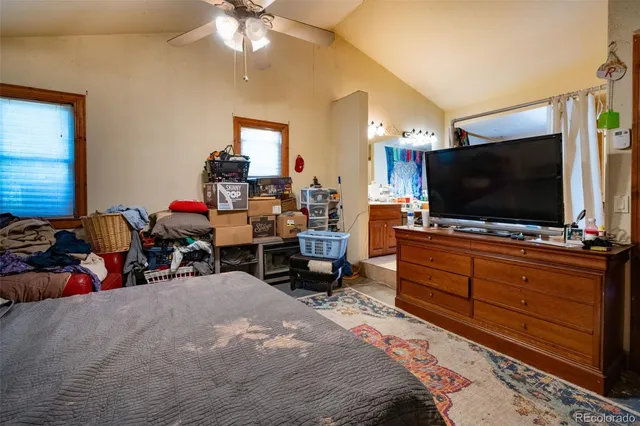 a room with furniture and a flat screen tv