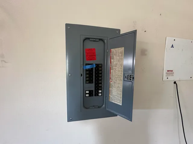 a view of empty room with a fireplace