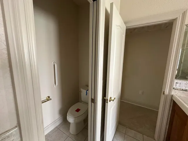 a kitchen with stainless steel appliances a stove a sink and a refrigerator