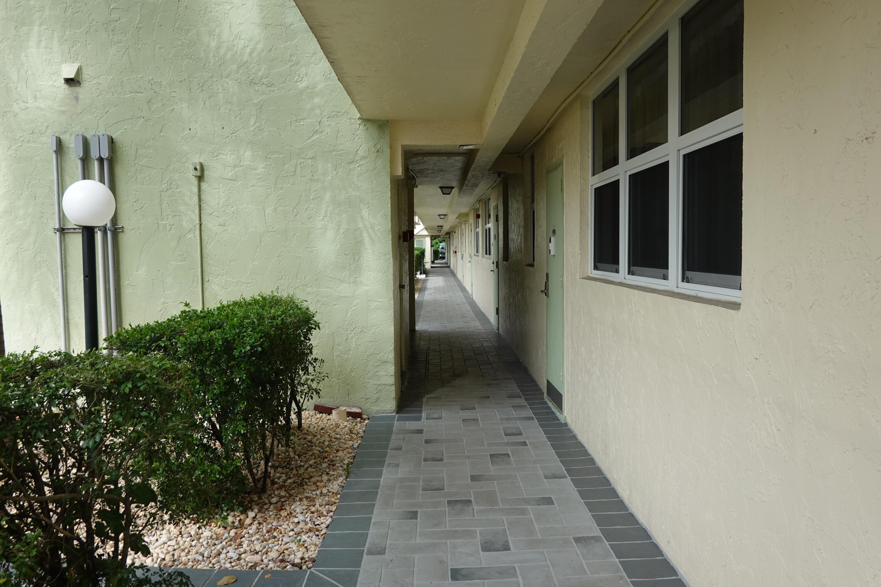 5321 Northeast 24th Terrace, Unit 112A Fort Lauderdale, FL 33308 - Photo 12 of 21 a view of a pathway of a house