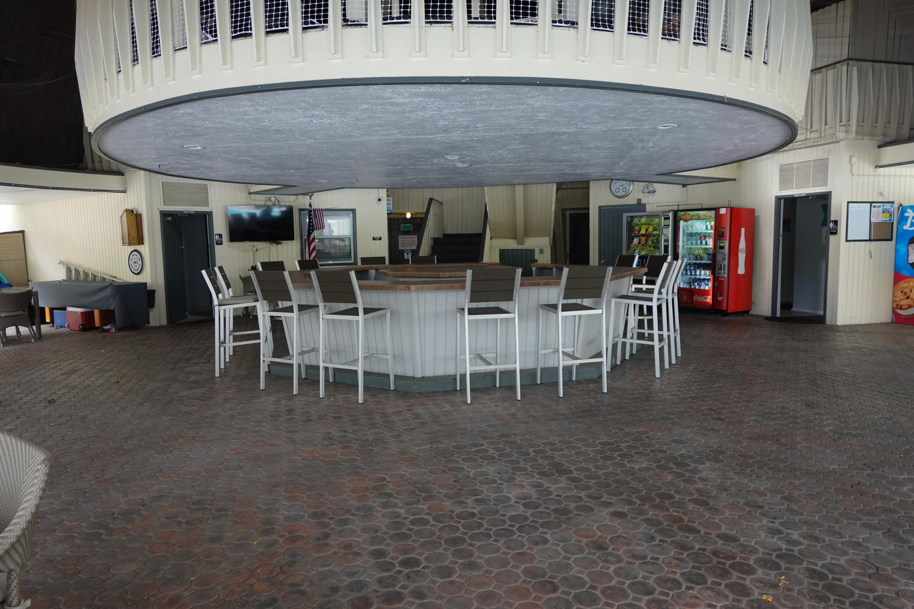 5321 Northeast 24th Terrace, Unit 112A Fort Lauderdale, FL 33308 - Photo 13 of 21 a dining area with a table and chairs