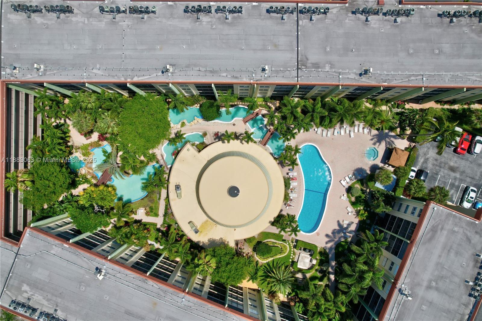 5321 Northeast 24th Terrace, Unit 112A Fort Lauderdale, FL 33308 - Photo 20 of 21 an aerial view of a house with a garden and plants