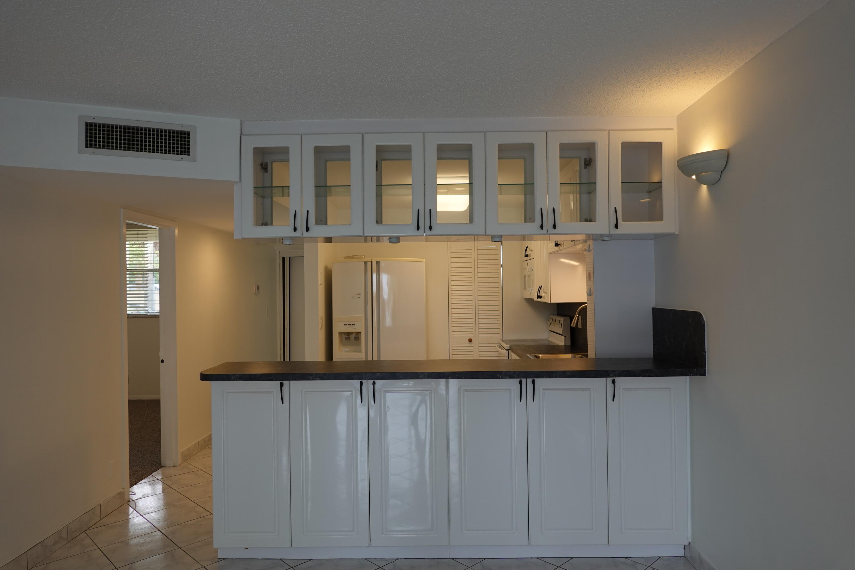 5321 Northeast 24th Terrace, Unit 112A Fort Lauderdale, FL 33308 - Photo 3 of 21 a view of a house with entryway