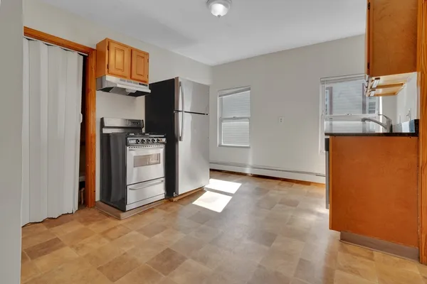 a view of a kitchen with a sink