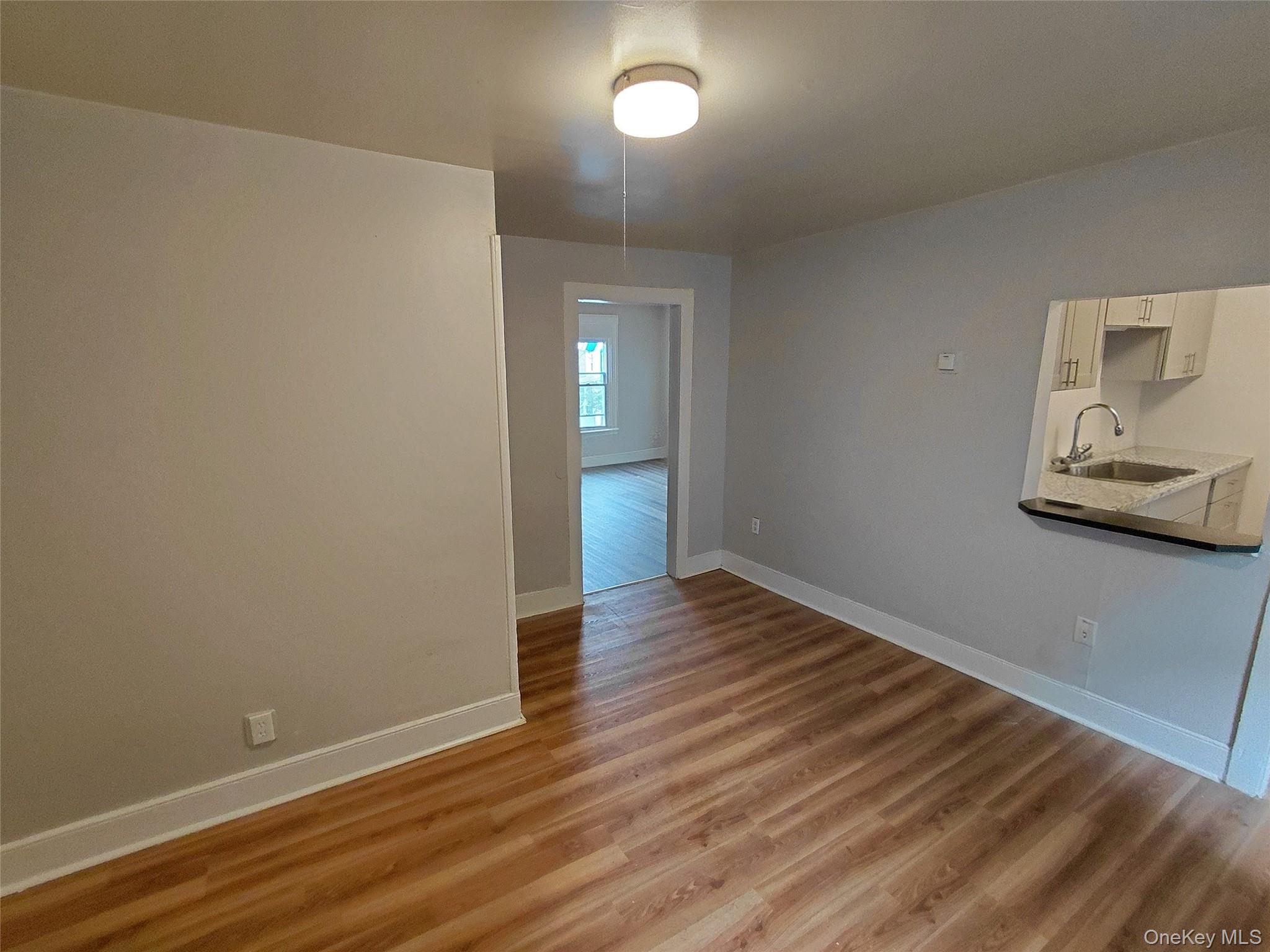 87 West Pierpont Street, Unit 4 Kingston, NY 12401 - Photo 4 of 13 a view of empty room with wooden floor