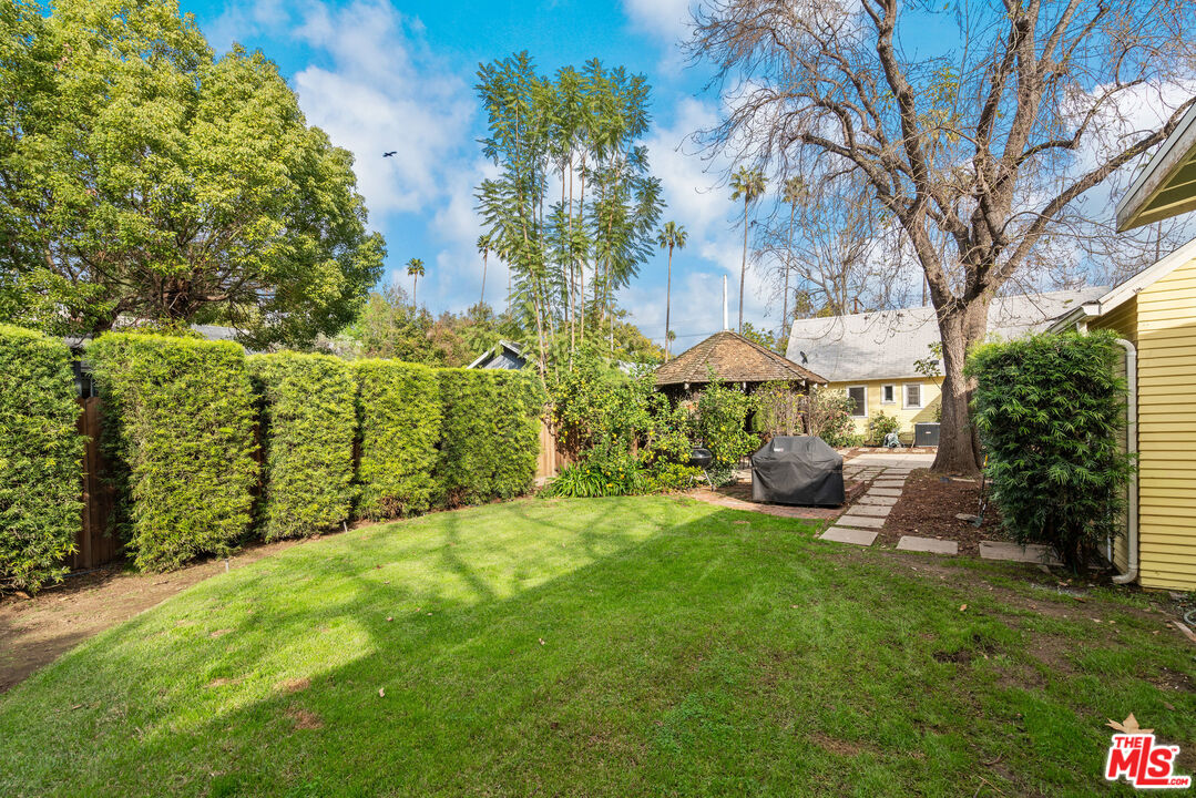 765 Mar Vista Avenue Pasadena, CA 91104 - Photo 31 of 42 a view of a chair and table on the garden