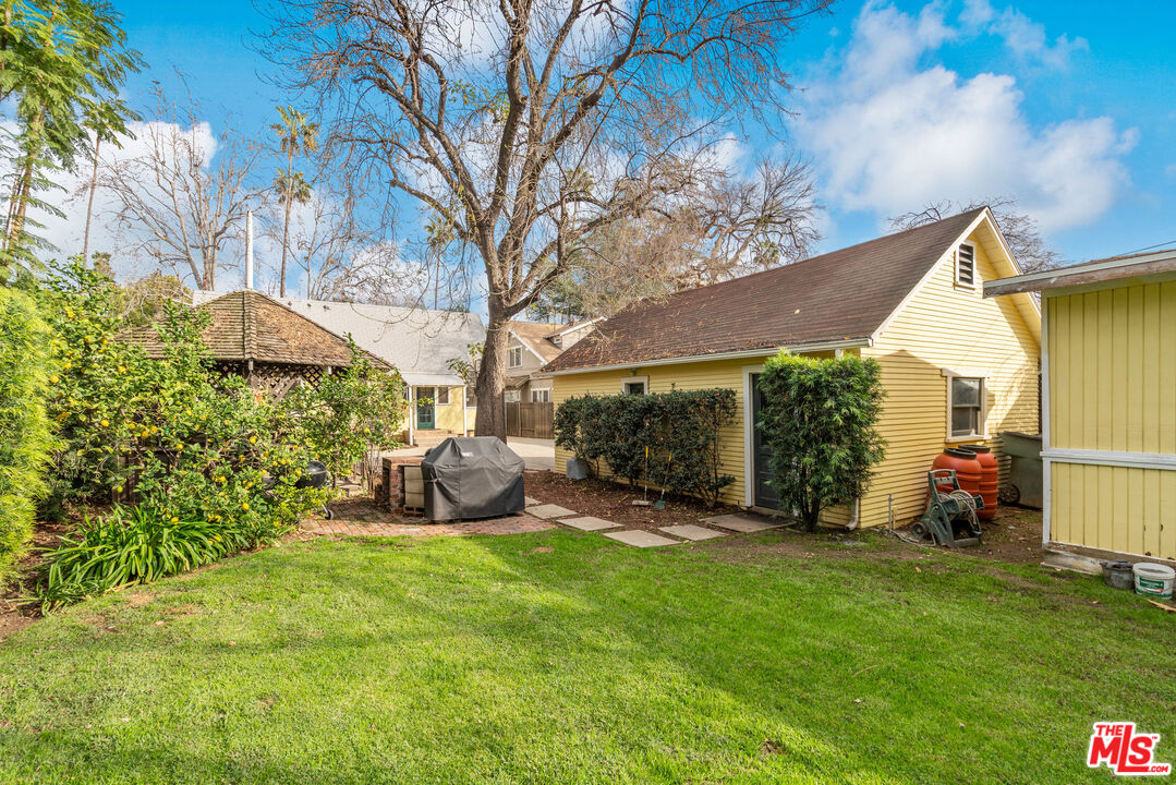 765 Mar Vista Avenue Pasadena, CA 91104 - Photo 33 of 42 a view of a chair and table in backyard