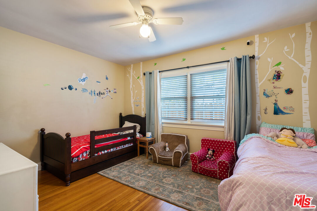 765 Mar Vista Avenue Pasadena, CA 91104 - Photo 40 of 42 a living room with furniture a table and a window