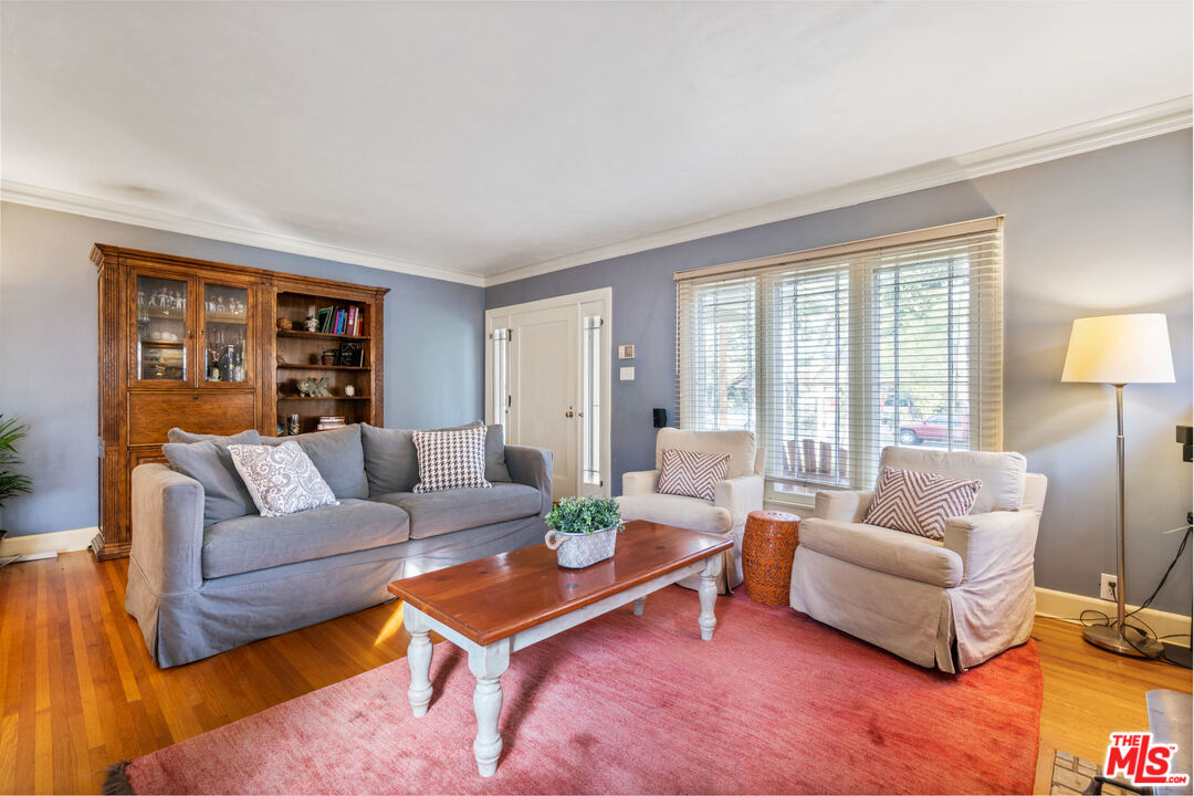 765 Mar Vista Avenue Pasadena, CA 91104 - Photo 9 of 42 a living room with furniture and a large window