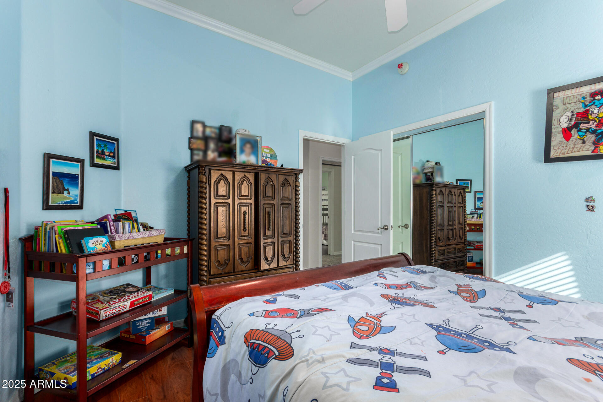 8912 North 15th Lane Phoenix, AZ 85021 - Photo 23 of 33 a bedroom with a bed and dresser