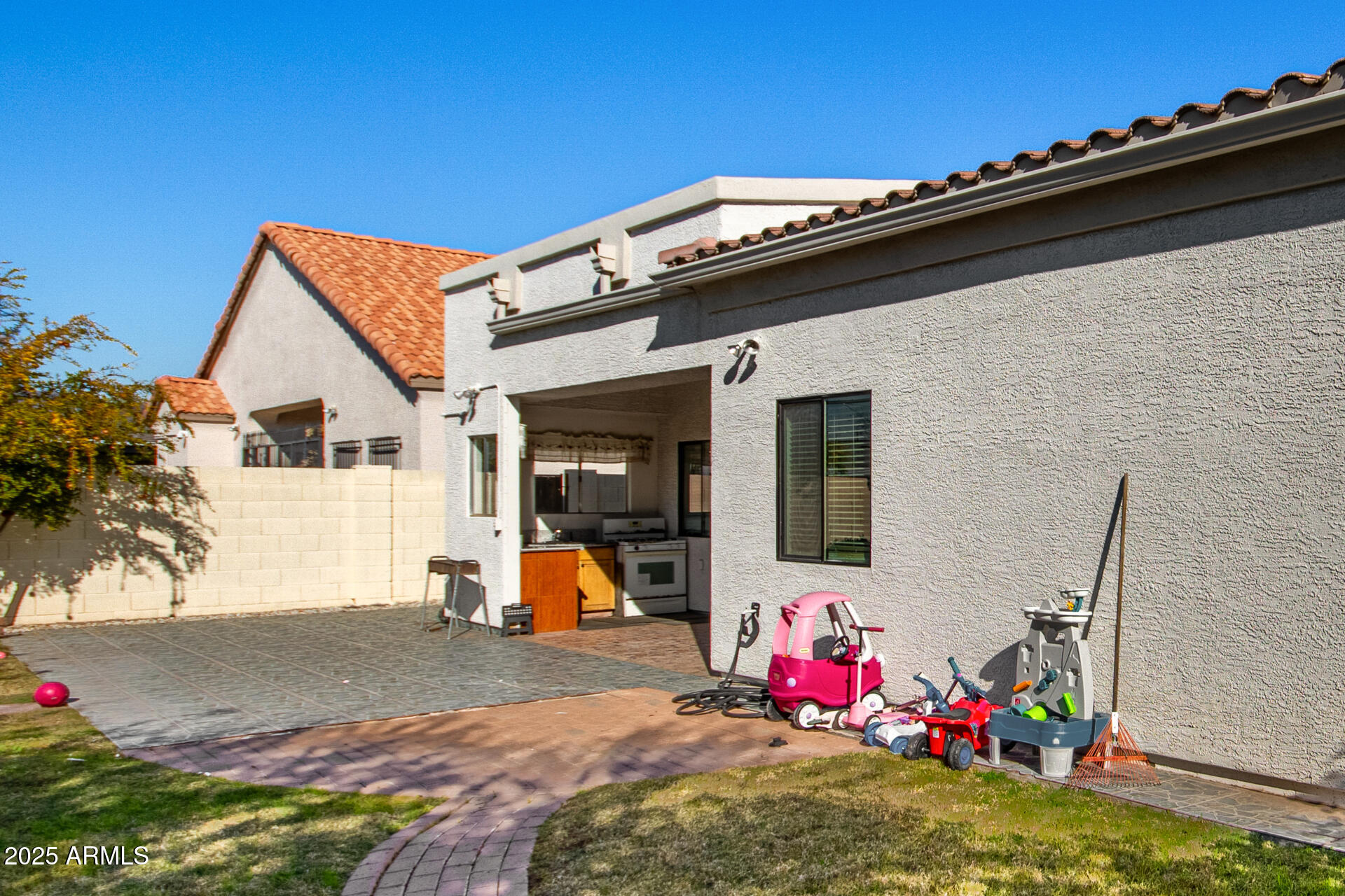 8912 North 15th Lane Phoenix, AZ 85021 - Photo 32 of 33 a view of a lounge chair in the backyard of a house