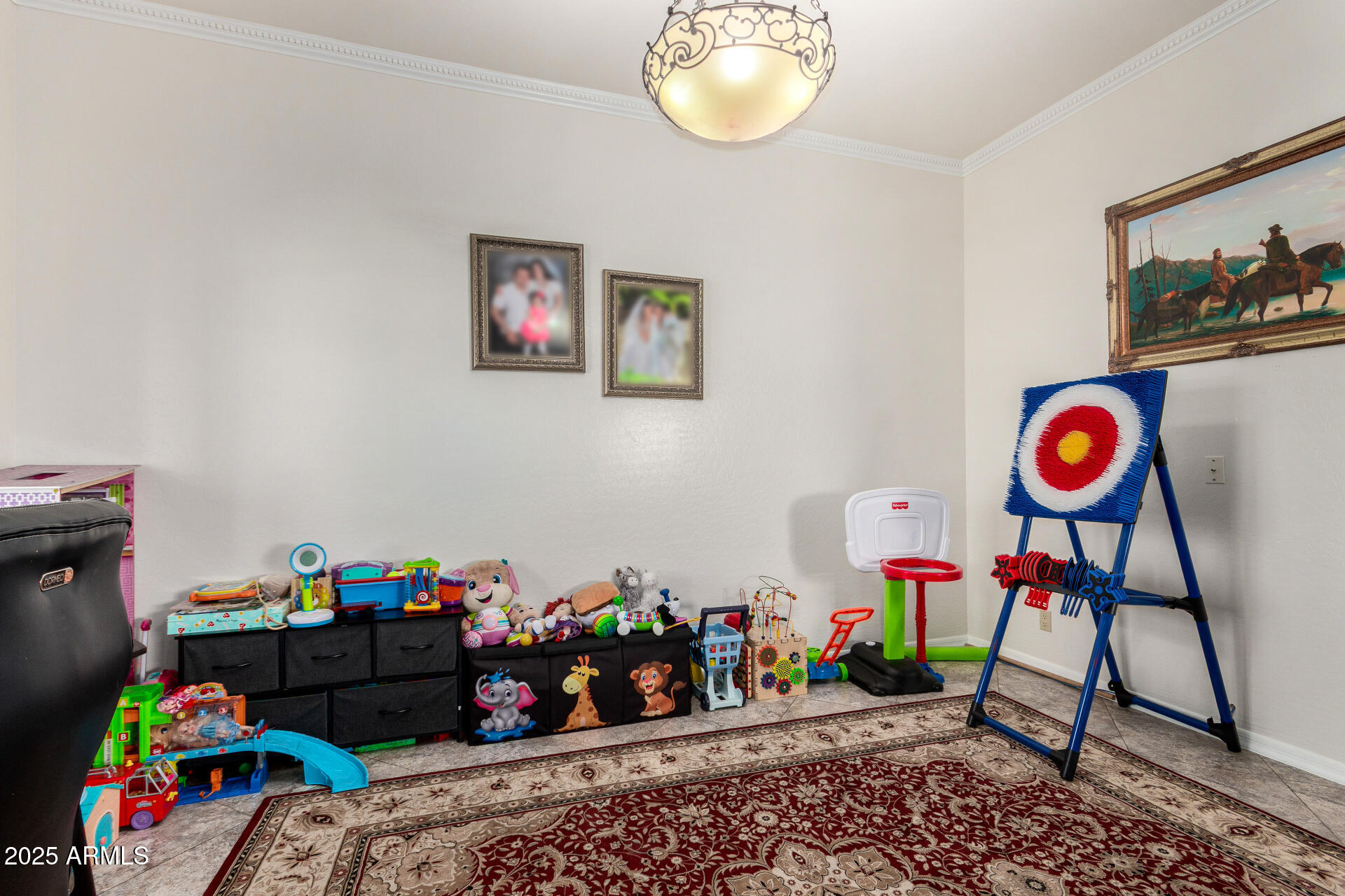 8912 North 15th Lane Phoenix, AZ 85021 - Photo 6 of 33 a bedroom with a bed and a chandelier
