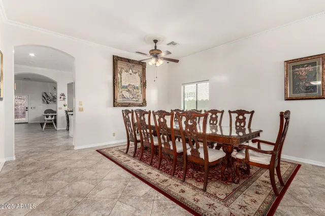 a view of a chairs and table in a room