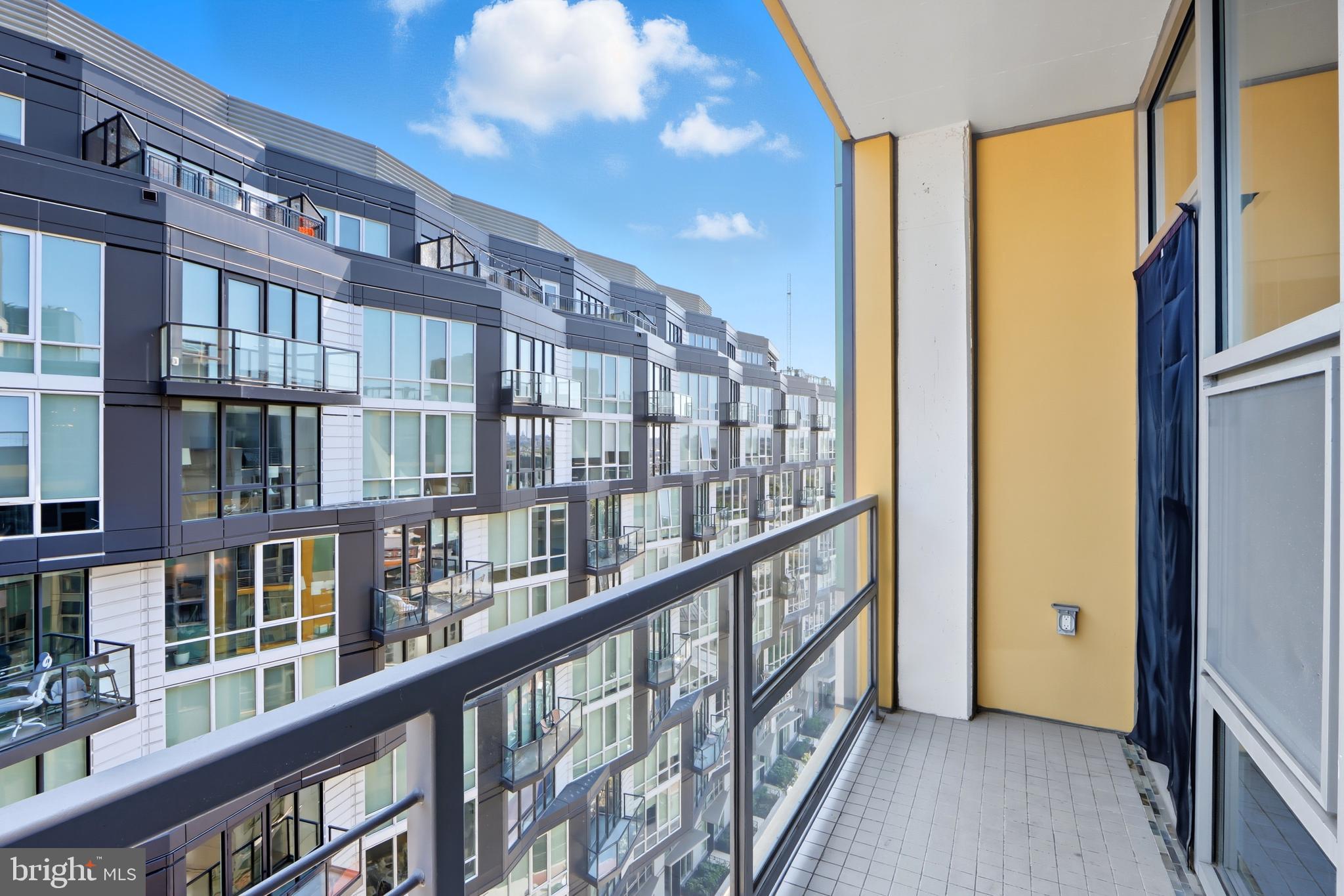 929 Florida Avenue Northwest, Unit 8001 Washington, DC 20001 - Photo 12 of 15 a view of staircase with large windows