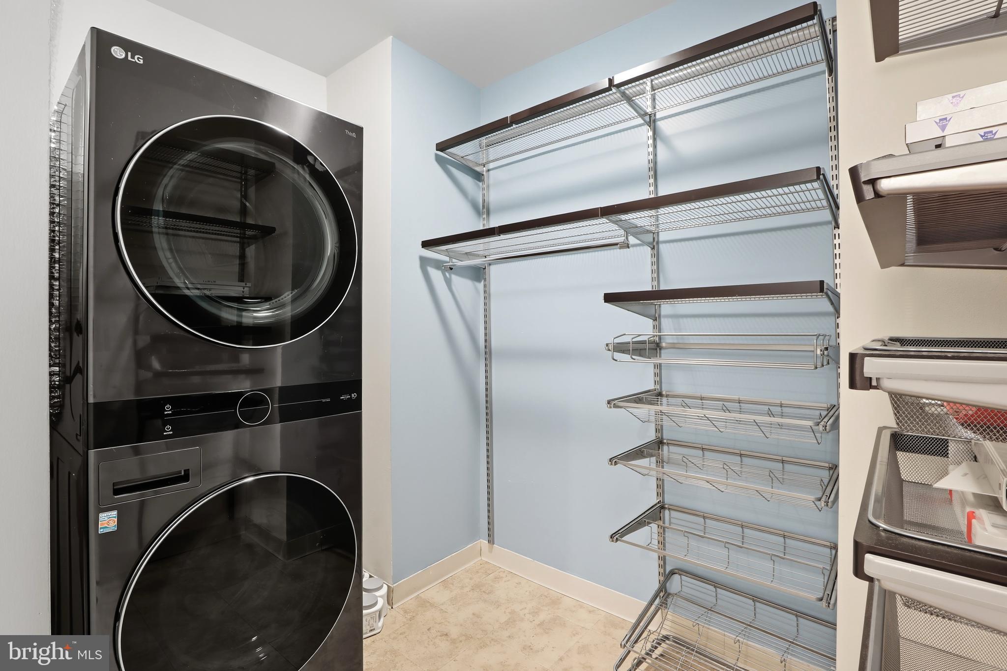 929 Florida Avenue Northwest, Unit 8001 Washington, DC 20001 - Photo 6 of 15 a kitchen with a washer and dryer