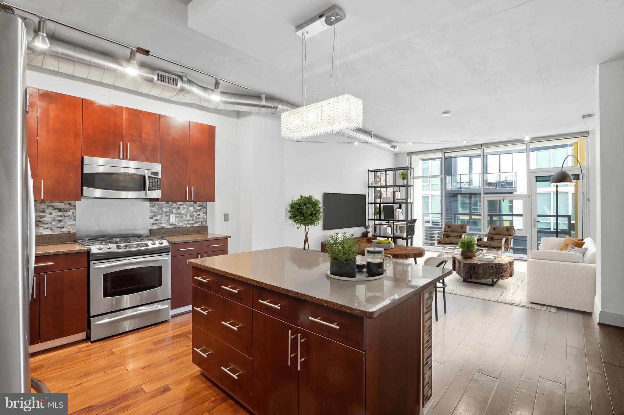 929 Florida Avenue Northwest, Unit 8001 Washington, DC 20001 - Photo 9 of 15 a kitchen with a sink stove and refrigerator