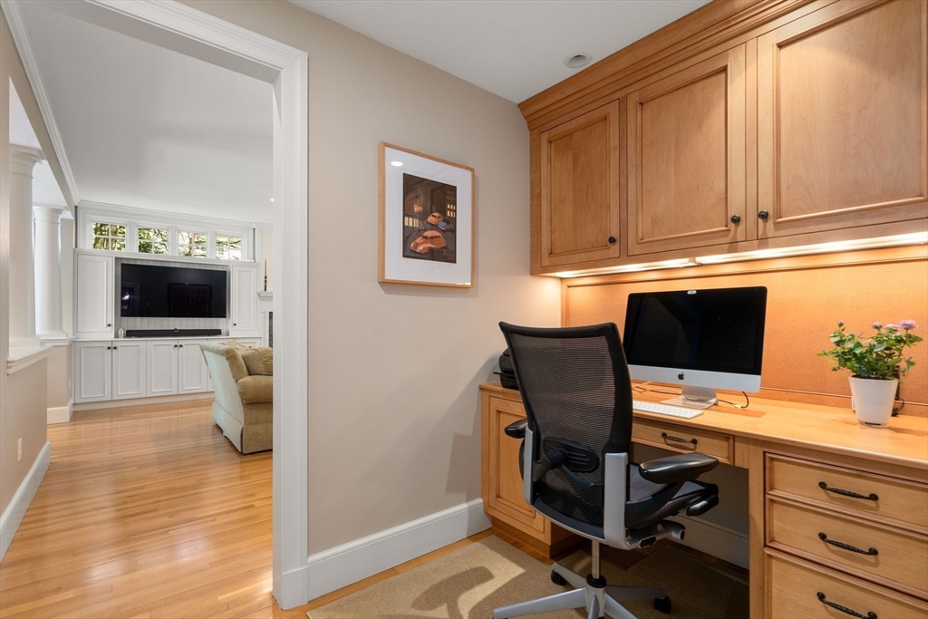30 Park Avenue Wellesley, MA 02481 - Photo 14 of 36 a view of a workspace with furniture and a window