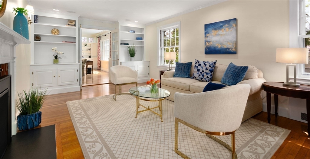30 Park Avenue Wellesley, MA 02481 - Photo 16 of 36 a living room with furniture a rug and a lamp