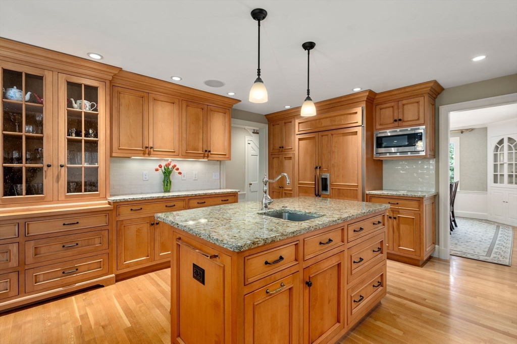 30 Park Avenue Wellesley, MA 02481 - Photo 6 of 36 a kitchen with a counter top space cabinets and stainless steel appliances