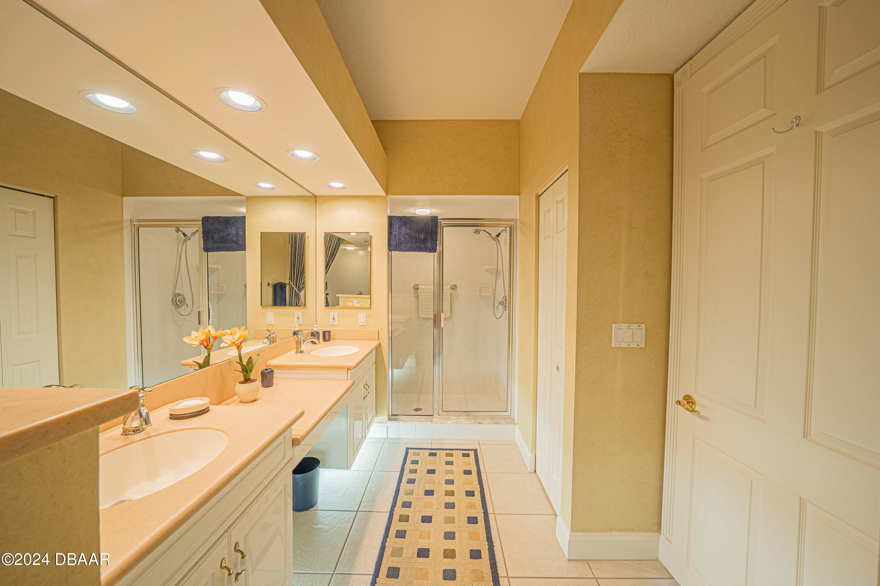 4625 Rivers Edge Village Lane, Unit 5301 Ponce Inlet, FL 32127 - Photo 29 of 50 ENSUITE BATHROOM 3