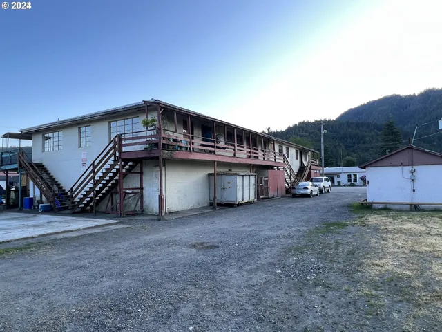 a view of a house with a roof deck