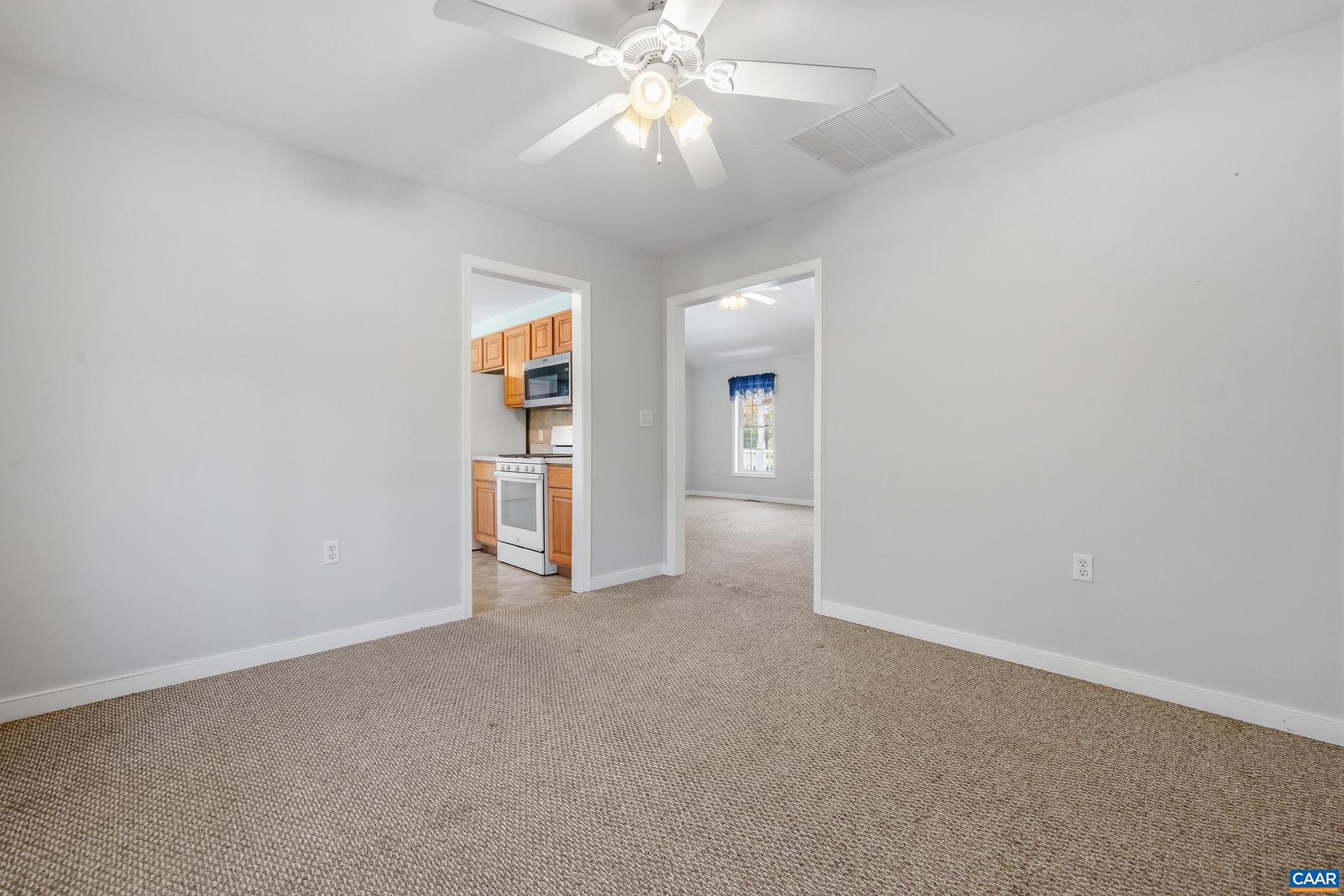 1075 Social Hall Road New Canton, VA 23123 - Photo 47 of 64 an empty room with closet and windows